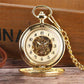 Antique gold pocket watch and chain front