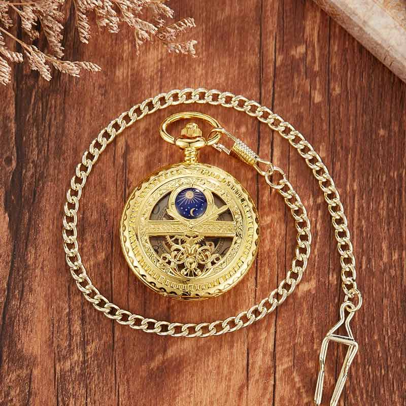 Gold skeleton pocket watch with chain