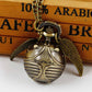 Golden snitch pocket watch front