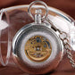 Silver open face pocket watch back