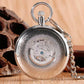 Silver pocket watch with chain back face